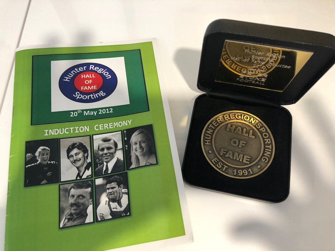 Hunter Region Sporting Hall of Fame induction ceremony program from 20 May 2012 and Peter Stone's inductee medallion